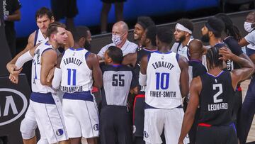 Kissimmee (United States), 30/08/2020.- Dallas Mavericks guard Luka Doncic of Slovenia (L) is separated from Los Angeles Clippers forward Marcus Morris Sr. (R) after a hard foul committed by Morris during the first half of the NBA basketball first-round Western Conference playoff game six between the Los Angeles Clippers and the Dallas Mavericks at the ESPN Wide World of Sports Complex in Kissimmee, Florida, USA, 30 August 2020. Morris was ejected from the game for a flagrant 2 foul against Doncic. (Baloncesto, Eslovenia, Estados Unidos) EFE/EPA/JOHN G. MABANGLO SHUTTERSTOCK OUT