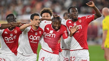 Monaco's players celebrate with Malian midfielder #04 Mohamed Camara (2R) after he scored Monaco's third goal during the French L1 football match between AS Monaco and FC Nantes at the Louis II Stadium (Stade Louis II) in the Principality of Monaco on May 19, 2024. (Photo by Nicolas TUCAT / AFP)
