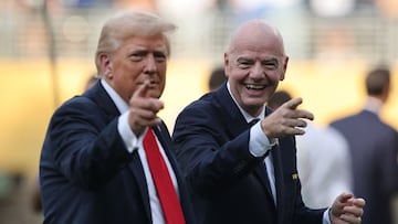 EAST RUTHERFORD, NEW JERSEY - JULY 13: U.S. President Donald Trump and Gianni Infantino, President of FIFA, react following the FIFA Club World Cup 2025 Final match between Chelsea FC and Paris Saint-Germain at MetLife Stadium on July 13, 2025 in East Rutherford, New Jersey. Alex Grimm/Getty Images/AFP (Photo by ALEX GRIMM / GETTY IMAGES NORTH AMERICA / Getty Images via AFP)
