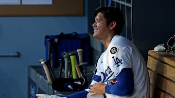 LOS ANGELES, CALIFORNIA - JUNE 16: Shohei Ohtani #17 of the Los Angeles Dodgers looks on from the dugout during the first inning against the San Diego Padres at Dodger Stadium on June 16, 2025 in Los Angeles, California. Harry How/Getty Images/AFP (Photo by Harry How / GETTY IMAGES NORTH AMERICA / Getty Images via AFP)