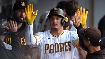 Jul 5, 2023; San Diego, California, USA; San Diego Padres third baseman Manny Machado (13) is congratulated in the dugout after hitting a home run against the Los Angeles Angels during the sixth inning at Petco Park. Mandatory Credit: Orlando Ramirez-USA TODAY Sports