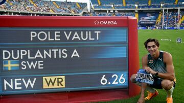 First placed Sweden�s Armand Duplantis poses next to a board displaying his new 6,26 meters world record after the men's pole vault event of the Silesia Diamond League athletics meeting in Chorzow, Poland, on August 25, 2024. (Photo by Sergei GAPON / AFP)