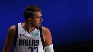 LAKE BUENA VISTA, FLORIDA - AUGUST 30: Luka Doncic #77 of the Dallas Mavericks looks back at Marcus Morris Sr. #31 of the LA Clippers after being fouled during the first quarter in Game Six of the Western Conference First Round during the 2020 NBA Playoffs at AdventHealth Arena at ESPN Wide World Of Sports Complex on August 30, 2020 in Lake Buena Vista, Florida. NOTE TO USER: User expressly acknowledges and agrees that, by downloading and or using this photograph, User is consenting to the terms and conditions of the Getty Images License Agreement. Kevin C. Cox/Getty Images/AFP
== FOR NEWSPAPERS, INTERNET, TELCOS & TELEVISION USE ONLY ==