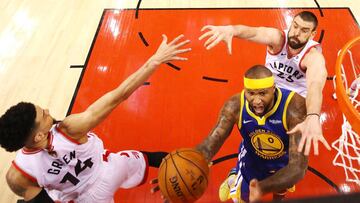 TORONTO, ONTARIO - JUNE 10: DeMarcus Cousins #0 of the Golden State Warriors attempts a shot against Danny Green #14 and Marc Gasol #33 of the Toronto Raptors during Game Five of the 2019 NBA Finals at Scotiabank Arena on June 10, 2019 in Toronto, Canada. NOTE TO USER: User expressly acknowledges and agrees that, by downloading and or using this photograph, User is consenting to the terms and conditions of the Getty Images License Agreement. Gregory Shamus/Getty Images/AFP
== FOR NEWSPAPERS, INTERNET, TELCOS & TELEVISION USE ONLY ==