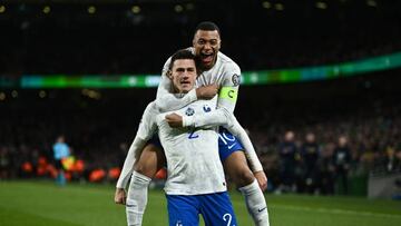 Dublin , Ireland - 27 March 2023; Benjamin Pavard of France, left, celebrates with team-mate Kylian Mbappé after scoring their side's first goal during the UEFA EURO 2024 Championship Qualifier match between Republic of Ireland and France at Aviva Stadium in Dublin. (Photo By Eóin Noonan/Sportsfile via Getty Images)
