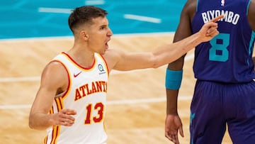 CHARLOTTE, NORTH CAROLINA - APRIL 11: Bogdan Bogdanovic #13 of the Atlanta Hawks reacts to a call against the Charlotte Hornets in the fourth quarter during their game at Spectrum Center on April 11, 2021 in Charlotte, North Carolina. NOTE TO USER: User expressly acknowledges and agrees that, by downloading and or using this photograph, User is consenting to the terms and conditions of the Getty Images License Agreement. Jacob Kupferman/Getty Images/AFP
== FOR NEWSPAPERS, INTERNET, TELCOS & TELEVISION USE ONLY ==