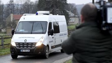 A jounalist on December 8, 2020 takes image of a judicial identification of the gendarmerie's van driving to the castle of Sautou which belonged to Michel Fourniret, near Donchery, northeastern France, where French serial killer is accused to have held captive and murdered nine-year-old Estelle Mouzin in 2003, during the investigation into the location of the girl's body. - New excavations began on December 7 to find the body of Estelle Mouzin. Fourniret, jailed for life in May 2008 for the murder of seven girls and young women, has been charged over Mouzin's disappearance. Fourniret admitted that he acquired the 'Chateau du Sautou' with stolen gold he recovered from the 'Gang des postiches' or 'Wig Gang'. (Photo by FRANCOIS LO PRESTI / AFP)