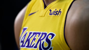(FILES) Lonzo Ball #2 of the Los Angeles Lakers wears his new Nike jersey with the sponsor's logo "Wish" on the left chests during media day September 25, 2017, in El Segundo, California. The Los Angeles Lakers are being sold in a record-breaking $10 billion deal that makes the iconic franchise the highest-valued sports team in US history, ESPN reported on June 18, 2025. (Photo by KEVORK DJANSEZIAN / GETTY IMAGES NORTH AMERICA / AFP)