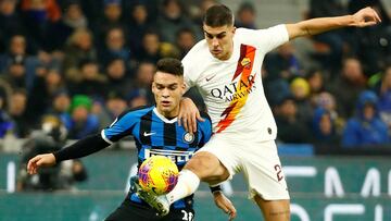 Soccer Football - Serie A - Inter Milan v AS Roma - San Siro, Milan, Italy - December 6, 2019 AS Roma's Gianluca Mancini in action with Inter Milan's Lautaro Martinez REUTERS/Alessandro Garofalo