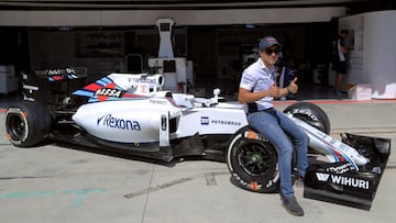 Formula One - F1 - Brazilian Grand Prix - Circuit of Interlagos, Sao Paulo, Brazil - 10/11/16 - Williams' driver Felipe Massa of Brazil poses for a photograph in front of his car designed specially for the Brazilian Grand Prix. REUTERS/Paulo Whitaker