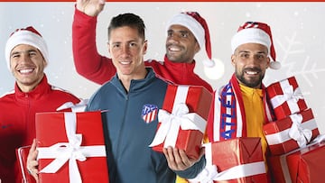 Los jugadores del Atlético con regalos.