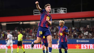 Barcelona's Spanish midfielder #16 Fermin Lopez celebrates scoring the opening goal during the 60th Joan Gamper Trophy football match between FC Barcelona and Como 1907 at Johan Cruyff Stadium in Barcelona on August 10, 2025. (Photo by Josep LAGO / AFP)