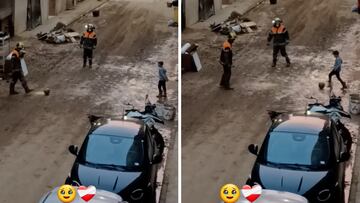 El emotivo gesto de dos bomberos con un niño en las calles devastadas por la DANA: media España conmocionada