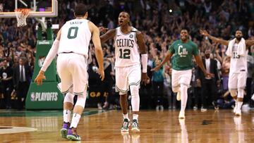 BOSTON, MA - MAY 9: Terry Rozier #12 of the Boston Celtics celebrates with Jayson Tatum #0 after hitting a three point shot to end the first half against the Philadelphia 76ers during Game Five of the Eastern Conference Second Round of the 2018 NBA Playoffs at TD Garden on May 9, 2018 in Boston, Massachusetts. Maddie Meyer/Getty Images/AFP
== FOR NEWSPAPERS, INTERNET, TELCOS & TELEVISION USE ONLY ==