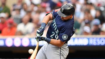 MINNEAPOLIS, MINNESOTA - JUNE 24: Cal Raleigh #29 of the Seattle Mariners hits an RBI single against the Minnesota Twins in the third inning of the game at Target Field on June 24, 2025 in Minneapolis, Minnesota. Stephen Maturen/Getty Images/AFP (Photo by Stephen Maturen / GETTY IMAGES NORTH AMERICA / Getty Images via AFP)