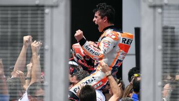Repsol Honda Team Spanish rider Marc Marquez celebrates after winning the Malaysia MotoGP at the Sepang International Circuit in Sepang on November 4, 2018. (Photo by Mohd RASFAN / AFP)