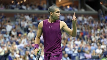Spain's Carlos Alcaraz gestures after a point won against Italy�s Mattia Bellucci during their men's singles second round tennis match on day four of the US Open tennis tournament at the USTA Billie Jean King National Tennis Center in New York City, on August 27, 2025. (Photo by CHARLY TRIBALLEAU / AFP)