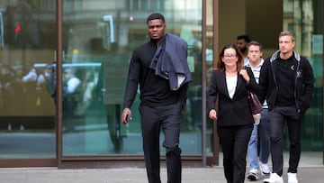 Former Arsenal player Thomas Partey, who has been charged with five counts of rape and one count of sexual assault, walks outside Westminster Magistrates' Court, in London, Britain, August 5, 2025. REUTERS/Hannah McKay