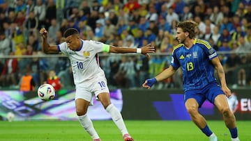 Soccer Football - World Cup - UEFA Qualifiers - Group D - Ukraine v France - Wroclaw Stadium, Wroclaw, Poland - September 5, 2025 France's Kylian Mbappe in action with Ukraine's Ilya Zabarnyi REUTERS/Kacper Pempel