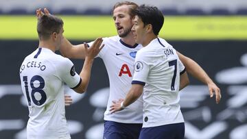Tottenham's Harry Kane, center, celebrates with Giovanni Lo Celso, left, and Son Heung-min after scoring his side's second goal during the English Premier League soccer match between Tottenham Hotspur and Leicester City, at the Tottenham Hotspur