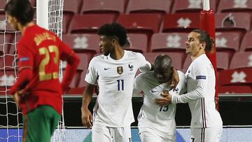 Soccer Football - UEFA Nations League - League A - Group 3 - Portugal v France - Estadio da Luz, Lisbon, Portugal - November 14, 2020 France's N'Golo Kante celebrates scoring their first goal with Kingsley Coman and Antoine Griezmann REUTERS/Rafael Marchante