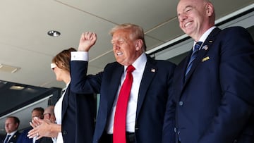 U.S. President Donald Trump gestures next to first lady Melania Trump and FIFA president Gianni Infantino as they attend the FIFA Club World Cup final at the MetLife Stadium in East Rutherford, New Jersey, U.S., July 13, 2025. REUTERS/Kevin Lamarque