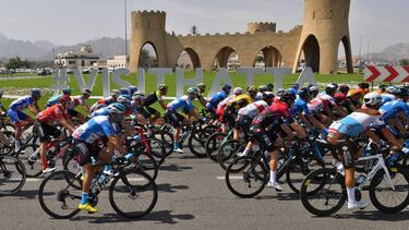 The peloton rides during the second stage of the UAE Cycling Tour from Hatta to Hatta Dam on February 23, 2020. (Photo by Giuseppe CACACE / AFP)