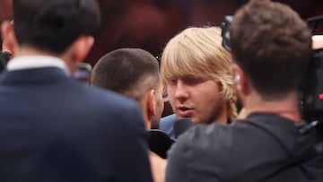 LAS VEGAS, NEVADA - JUNE 28: Ilia Topuria of Georgia and Paddy Pimblett of the United Kingdom exchange words after Topuria won the lightweight main event title during UFC 317 at T-Mobile Arena on June 28, 2025 in Las Vegas, Nevada. Ian Maule/Getty Images/AFP (Photo by Ian Maule / GETTY IMAGES NORTH AMERICA / Getty Images via AFP)
