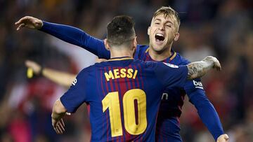 BARCELONA, SPAIN - OCTOBER 21: Gerard Deulofeu (R) of Barcelona celebrates with Lionel Messi of Barcelona after scoring the first goal during the La Liga match between Barcelona and Malaga at Camp Nou on October 21, 2017 in Barcelona, Spain. (Photo by f