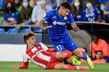 Antoine Griezmann y Mathías Olivera.