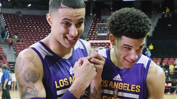 LAS VEGAS, NV - JULY 15: Kyle Kuzma #0 and Lonzo Ball #2 of the Los Angeles Lakers walk off the court after the team's 115-106 win over the Brooklyn Nets during the 2017 Summer League at the Thomas & Mack Center on July 15, 2017 in Las Vegas, Nevada. NOTE TO USER: User expressly acknowledges and agrees that, by downloading and or using this photograph, User is consenting to the terms and conditions of the Getty Images License Agreement. Ethan Miller/Getty Images/AFP
== FOR NEWSPAPERS, INTERNET, TELCOS & TELEVISION USE ONLY ==