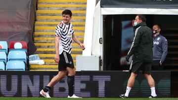 BIRMINGHAM, ENGLAND - MAY 09: Harry Maguire of Manchester United reacts as he leaves the pitch following an injury during the Premier League match between Aston Villa and Manchester United at Villa Park on May 09, 2021 in Birmingham, England. Sporting sta