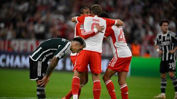 Bayern Munich's German midfielder #10 Leroy Sane (L) celebrates scoring the opening goal with his teammates Bayern Munich's English forward #09 Harry Kane and Bayern Munich's German midfielder #42 Jamal Musiala during the UEFA Champions League Group A football match FC Bayern Munich v Manchester United in Munich, southern Germany on September 20, 2023. (Photo by Tobias SCHWARZ / AFP)