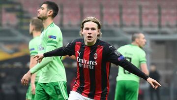 AC Milan's Norwegian forward Jens Petter Hauge celebrates after scoring the third goal during the UEFA Europa League Group H football match AC Milan vs Celtic on December 3, 2020 at the San Siro stadium in Milan. (Photo by Vincenzo PINTO / AFP)