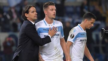 Lazio's Italian coach Simone Inzaghi (L) congratulates Lazio's Serbian midfielder Sergej Milinkovic-Savic at the end of the UEFA Europa League group H football match Lazio Rome vs Marseille on November 8, 2018 at the Olympic stadium in Rome. (Ph