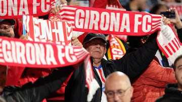 Girona's supporters cheer before the start of the Spanish league football match between Girona FC and Villarreal CF at the Montilivi stadium in Girona on May 14 , 2024. (Photo by LLUIS GENE / AFP)