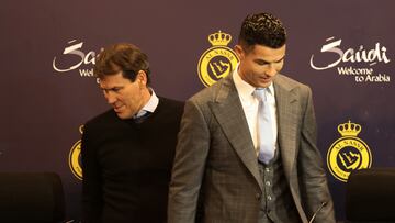Soccer Football - Al Nassr unveil new signing Cristiano Ronaldo - Mrsool Park, Riyadh, Saudi Arabia - January 3, 2023 Al Nassr coach Rudi Garcia and new signing Cristiano Ronaldo during the press conference REUTERS/Ahmed Yosri