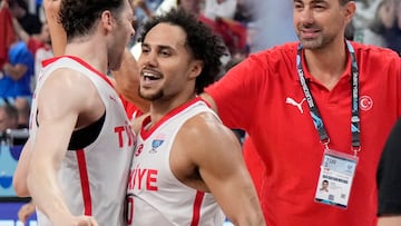 Turkey's Shane Larkin celebrates after the match.