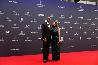 El atleta estadounidense Michael Johnson y su pareja, Armine Shamiryan.