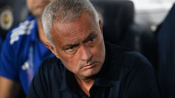 Fenerbahce's Portuguese head coach Jose Mourinho looks on from the bench ahead of the start of the UEFA Champions League play off first leg football match between Fenerbahce (TUR) and Benfica (POR) at the Fenerbahce Sukru Saracoglu Sport Complex in Istanbul on August 20, 2025. (Photo by Ozan KOSE / AFP)