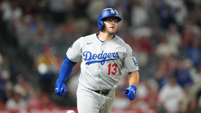 Aug 11, 2025; Anaheim, California, USA; Los Angeles Dodgers third baseman Max Muncy (13) runs the bases after hitting a three-run home run in the eighth inning against the Los Angeles Angels at Angel Stadium. Mandatory Credit: Kirby Lee-Imagn Images