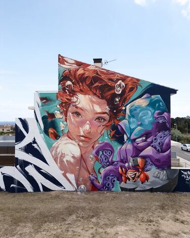 Este trabajo se creó para el Festival de Arte Urbano EFIMUR en L’Ametlla de Mar en noviembre de 2024. Está situado en Carrer 11 de Setembre, nº 23-C, de la localidad de Tarragona.  
