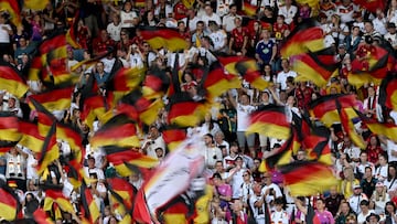 German fans wave flags during the UEFA Women's Euro 2025 Group C football match between Sweden and Germany at Letzigrund Stadium in Zurich, on July 12, 2025. (Photo by Miguel MEDINA / AFP)