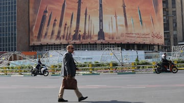 An anti-Israel billboard with a picture of Iranian missiles is seen in a street in Tehran, Iran April 15, 2024. Majid Asgaripour/WANA (West Asia News Agency) via REUTERS ATTENTION EDITORS - THIS IMAGE HAS BEEN SUPPLIED BY A THIRD PARTY.