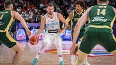 Slovenia�s Luka Doncic (C) dribbles the ball during the FIBA Basketball World Cup group K match between Slovenia and Australia at Okinawa Arena in Okinawa on September 1, 2023. (Photo by Yuichi YAMAZAKI / AFP)