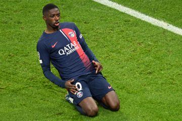 Paris Saint-Germain's French forward #10 Ousmane Dembele celebrates after scoring his team's second goal which was later disallowed during the UEFA Champions League Group F football match between Paris Saint-Germain (PSG) and AC Milan at the Parc de Princes in Paris on October 25, 2023. (Photo by Bertrand GUAY / AFP)