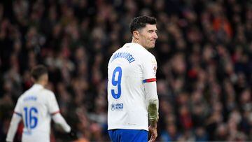 Barcelona's Polish forward #09 Robert Lewandowski reacts during the Spanish league football match between Athletic Club Bilbao and FC Barcelona at the San Mames stadium in Bilbao on March 3, 2024. (Photo by ANDER GILLENEA / AFP)