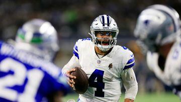 ARLINGTON, TEXAS - NOVEMBER 30: Quarterback Dak Prescott #4 of the Dallas Cowboys scrambles during the 2nd quarter of the game against the Seattle Seahawks at AT&T Stadium on November 30, 2023 in Arlington, Texas.   Ron Jenkins/Getty Images/AFP (Photo by Ron Jenkins / GETTY IMAGES NORTH AMERICA / Getty Images via AFP)