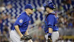 Chicago Cubs starting pitcher Mike Montgomery, left, talks with catcher Miguel Montero during the first inning of a baseball game against the Miami Marlins, Sunday, June 25, 2017, in Miami. (AP Photo/Lynne Sladky)