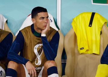 A glum-faced Ronaldo started on the bench for Portugal's game against Morocco.
